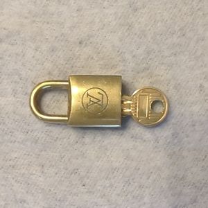 Louis Vuitton LV Lock and Key (#218) ATTENTION: Price drop from $150.